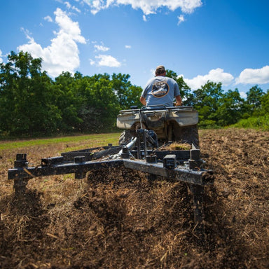 Rear View Kunz Engineering Till Ease Model 543 Chisel Plow Drag Harrow Mounted On UTV