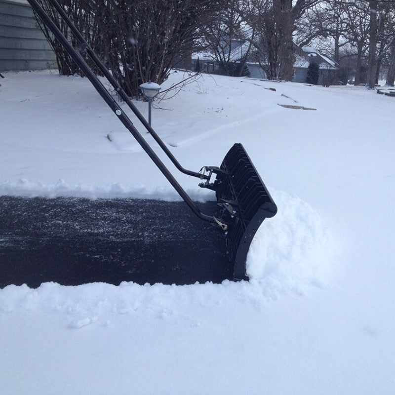 24" Perfect Shovel by Nordic Plow on driveway