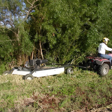 Mowing Shrub Beside the tree using Kunz Engineering AcrEase Rough Cut Mower Model MR55BE