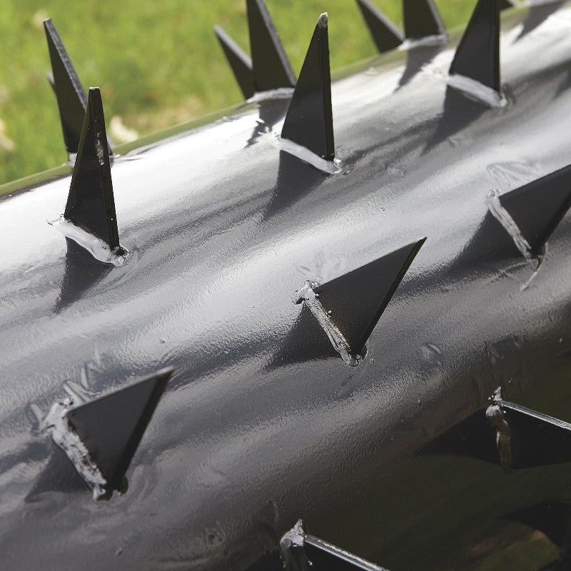 Close Up View of the Strongway 36 Inch Drum Lawn Aerator Spikes