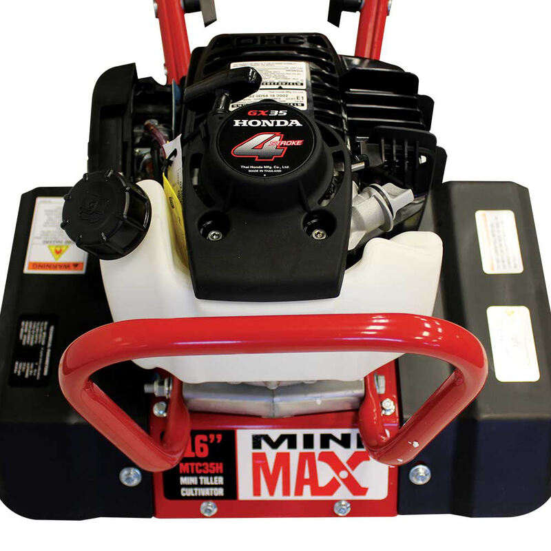 closed up view of maxim mini max tiller red handle bar and its Honda GX35 engine