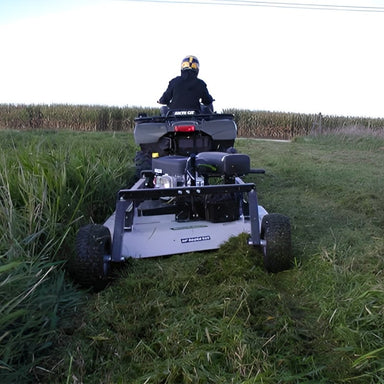 Kunz Engineering Rough Cut Mower MR44BE towed behind atv mowing tall grass field