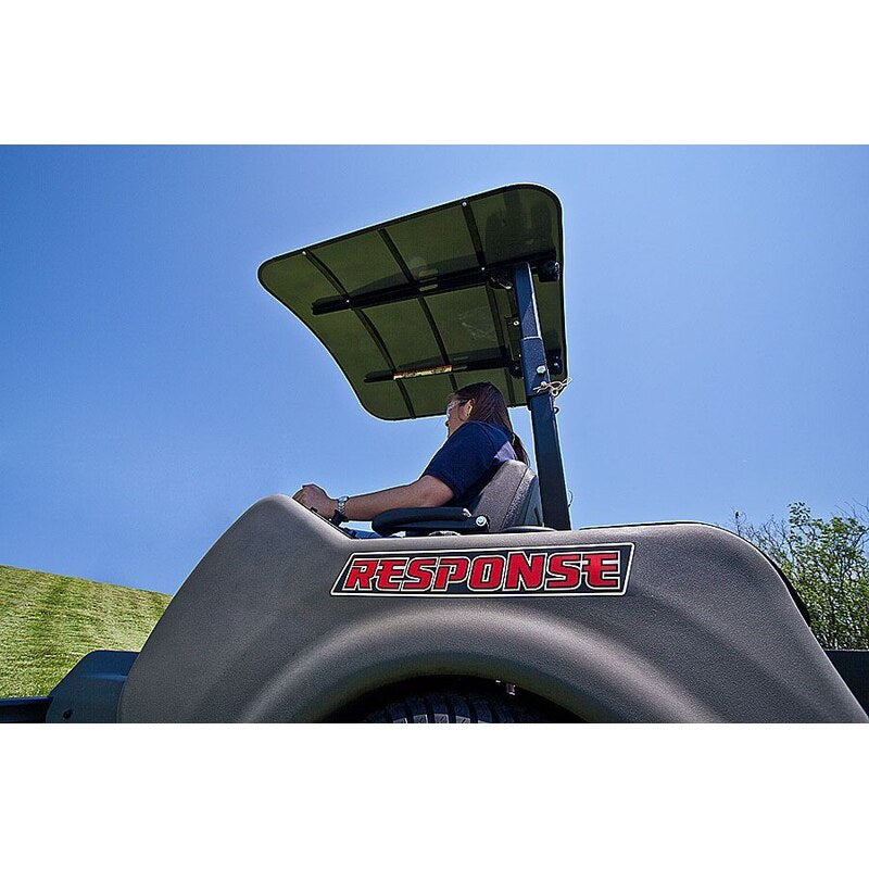 lower side view of a Woman riding on her Zero turn mower with sunshade