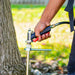 Man holding the Tomahawk Irrigation Rod Attachment for Backpack Sprayer