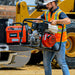 Man Loading the Tomahawk TW3H 3" Industrial Full Trash Pump Powered By Honda 8HP GX270 on HIs Truck