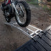 Motorcycle climbing the Yutrax 89" Folding XL Aluminum Arch Ramps