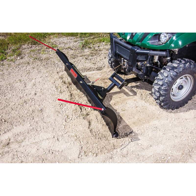 top view of UTV plow mounted on green UTV