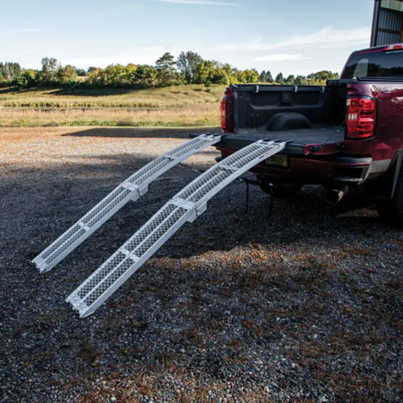 Yutrax 89" Folding XL Aluminum Arch Ramps mounted on the vehicle