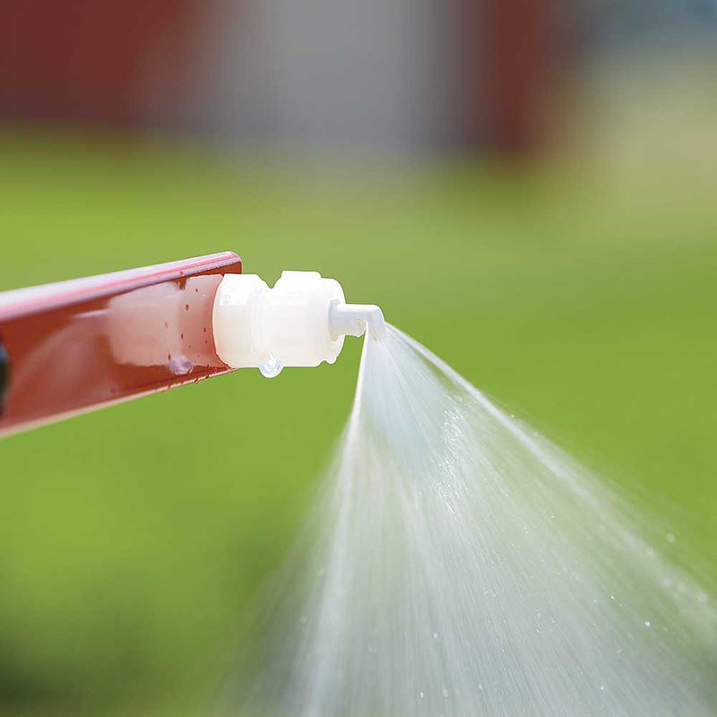 a water coming coming out in a sprayer nozzle in high pressure