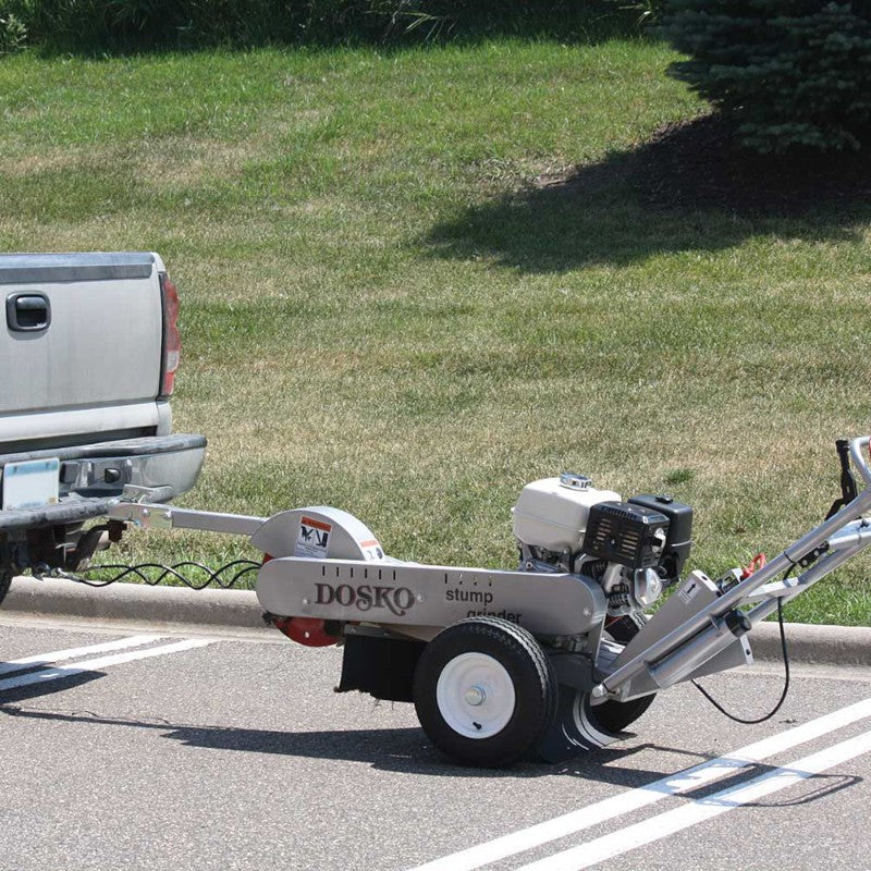 dosko stump grinder tow package 337 13hc being towed behind a truck