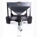 Front view of swisher  221500 drop feeder with a storage tray