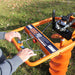 a hands on the handle and throttle of BravePro Towable Earth Auger Honda GX390 Engine (BRPA385H)