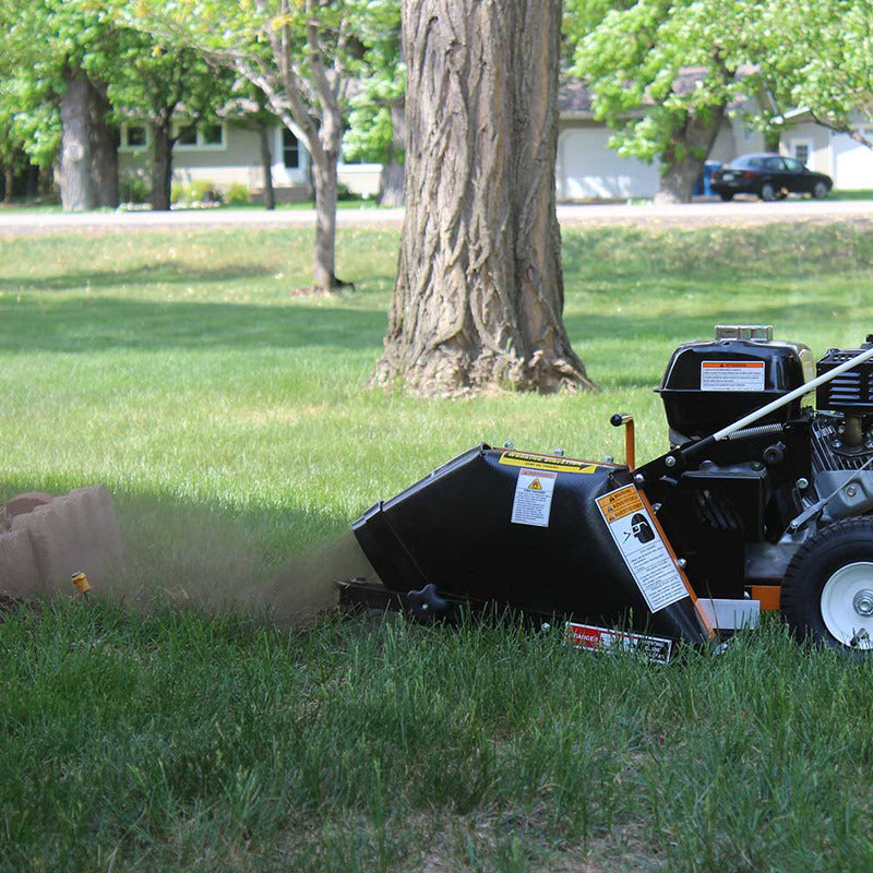 Side View of Brave Pro Wire Pow'r Installer with Honda GX160 Engine (BRPT4H) on the lawn with a lot of dust