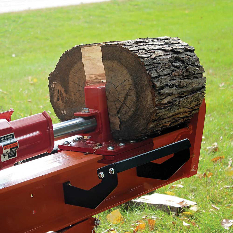 Closed up view of log splitter wedge ion the center of the logs