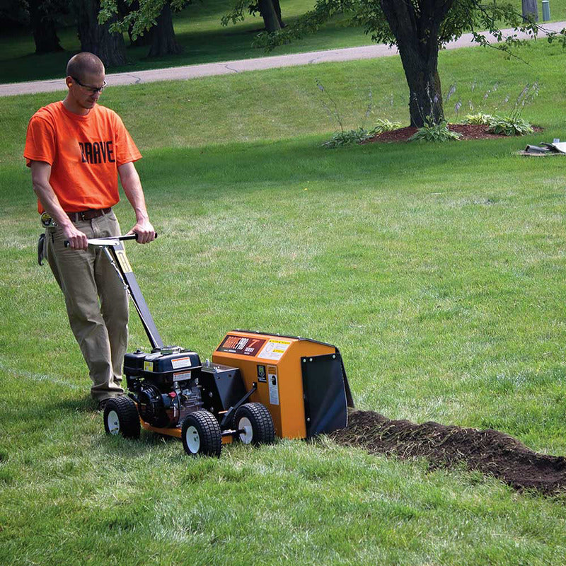 Man Operating the  Brave Pro Trencher Clay Rotor Edger 7in. with Honda GX200 196cc(BRPT704H)