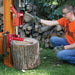 Man operating the Brave VH1724GC 24 Ton Log Splitter Powered by Honda GC160 on vertical position