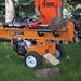 Side view of Brave VH1730GC 30 Ton Log Splitter Powered by Honda GC190 with a man wearing orange shirt