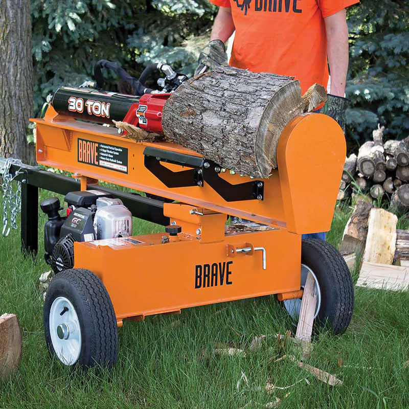 Man Split the log with Brave VH1730GC 30 Ton Log Splitter Powered by Honda GC190