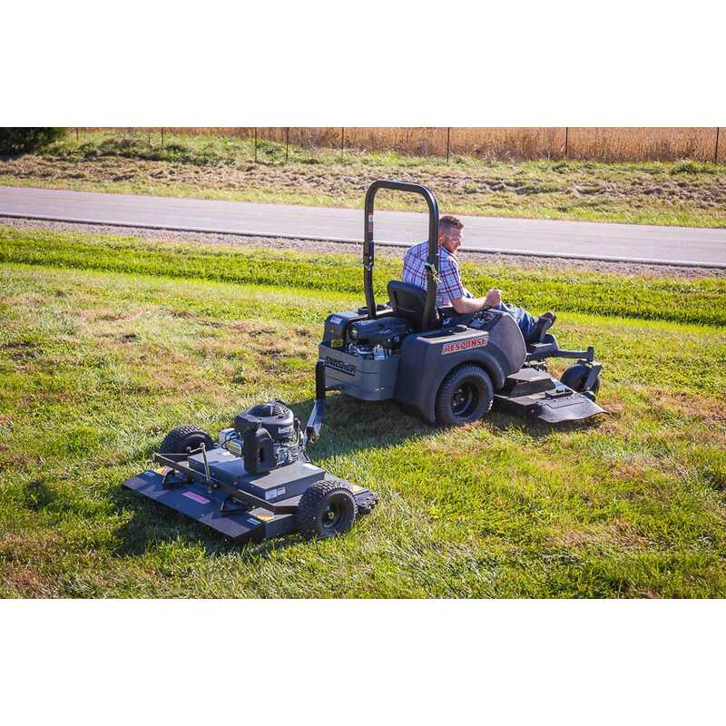 man riding his swisher response with Swisher FCE11544BS  44" Fast Finish Cut Trailmower installed