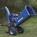 Powerhorse Towable Wood Chipper/Shredder  parked on the grassy yard