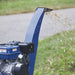 Powerhorse Towable Wood Chipper/Shredder  with mulch flying out the blower